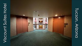 Glass Elevators at the Ramada by Wyndham Viscount Suite Hotel in Tucson, AZ
