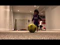 Zara parmar learning to kick a ball