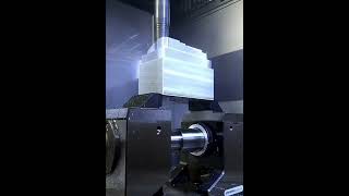 A six-axis machining center that requires computer-aided programming is in process!