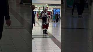 Little boy runs into Santa’s arms