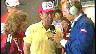 Celebrity Auto Racing - 1987 - Indy 500 - ABCs Al Trautwig In The Garage Of Car # 87 With Driver Steve Chassey Wealth