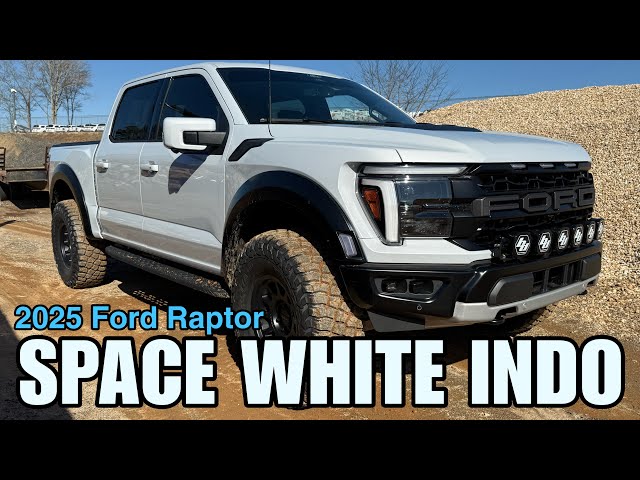 White Ford Raptor Lifted