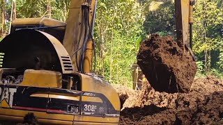 Story line of Excavating Soil and Moving Soil to the Edge by a Mini Excavator.