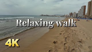 Beach paradise. A relaxing walk along Levante Beach, Benidorm, Costa Blanca, Spain. 4K Relax video
