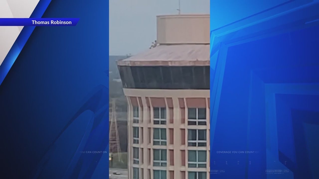 На видео видны люди на крыше пустующего отеля STL, что вызвало опасения по поводу безопасности