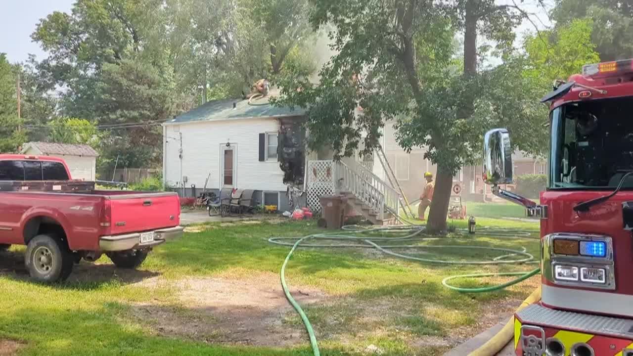 Firefighters battle house fire in central Lincoln - YouTube