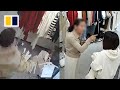 Woman vents at staff after being caught stealing hangers