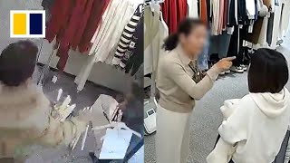 Woman vents at staff after being caught stealing hangers