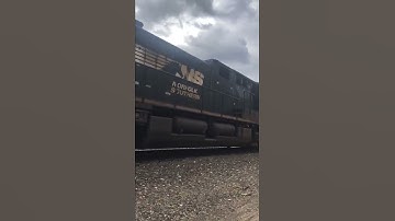 Close up video of idling BNSF with NS engine