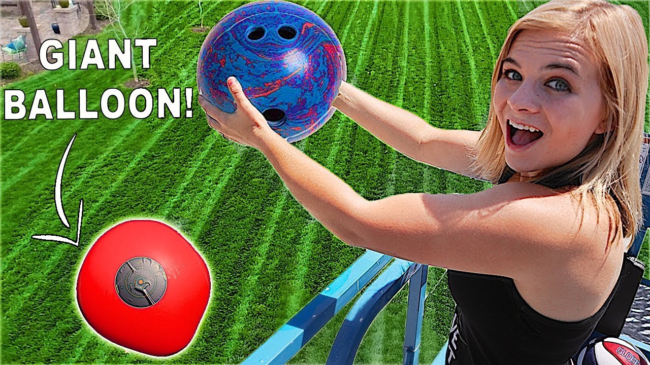 BREAKING OPEN GIANT WATER BALLOON! Bowling Ball vs Giant Balloon