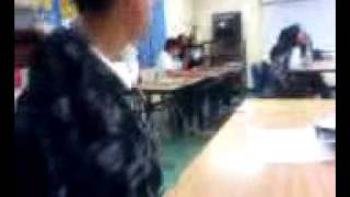 Throwing a history book across the classroom
