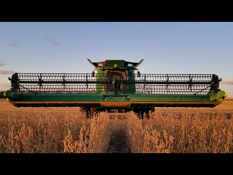 John Deere S680 Combine and NEW Draper Header!