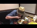 Japanese man eating rice by hand