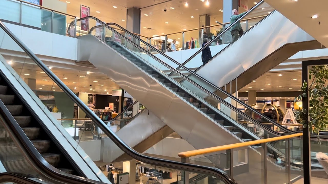 Cheadle, England. 4x O&K Escalator ride at John Lewis Department store