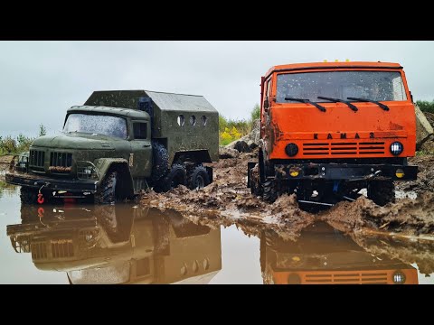 Видео: 6Х6 просто ПРЁТ по бездорожью! ... КАМАЗ против ЗИЛ 131 по грязи... RC OFFroad