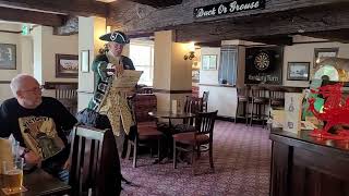 Bromsgrove Town Cryer reads out a statement regarding the death of our Queen. the Hanbury Turn Pub.