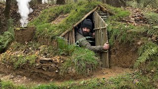 Building complete and wąrm survival shelter | Bushcraft earth hut, grass roof & fireplace with clay