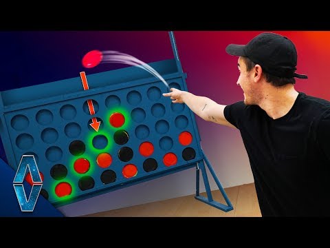 Playing GIANT Connect 4 With Frisbees!