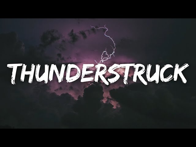 AC/DC - Thunderstruck (Lyrics) class=
