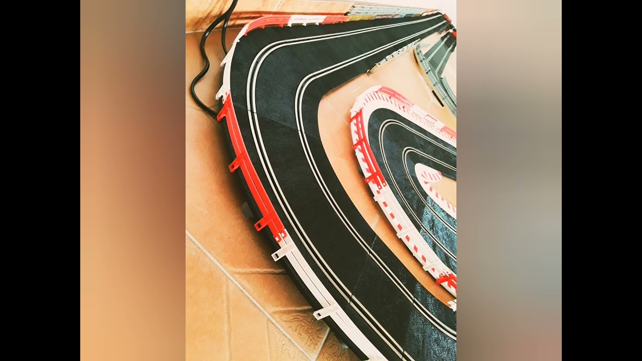 Scalextric and Ninco with Ninco converter tracks