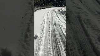 Boy Ice Skates Using Surfboard