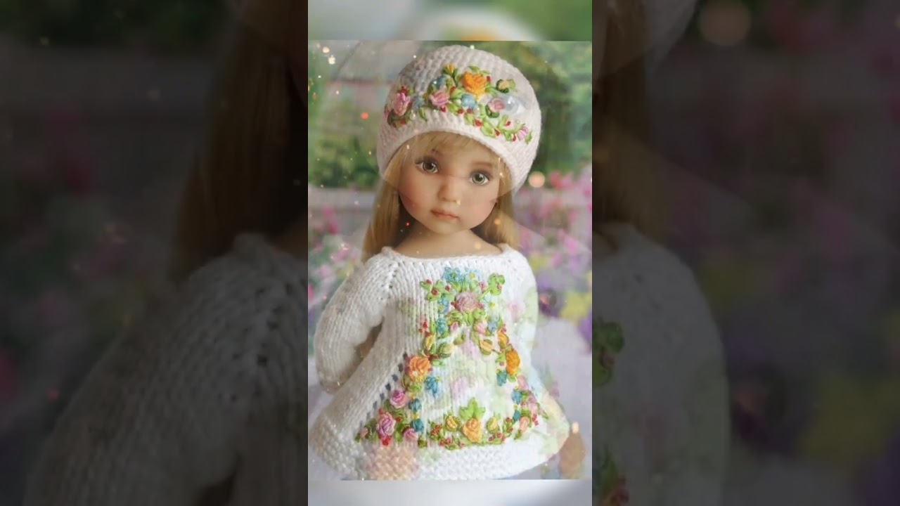 Stunning knitted Mini doll dress with embroidery,