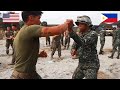 Balikatan 23  philippine marines demonstrate martial arts techniques to us marines