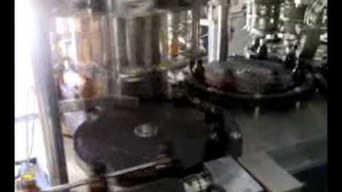 MONOBLOCK LIQUID FILLING MACHINE