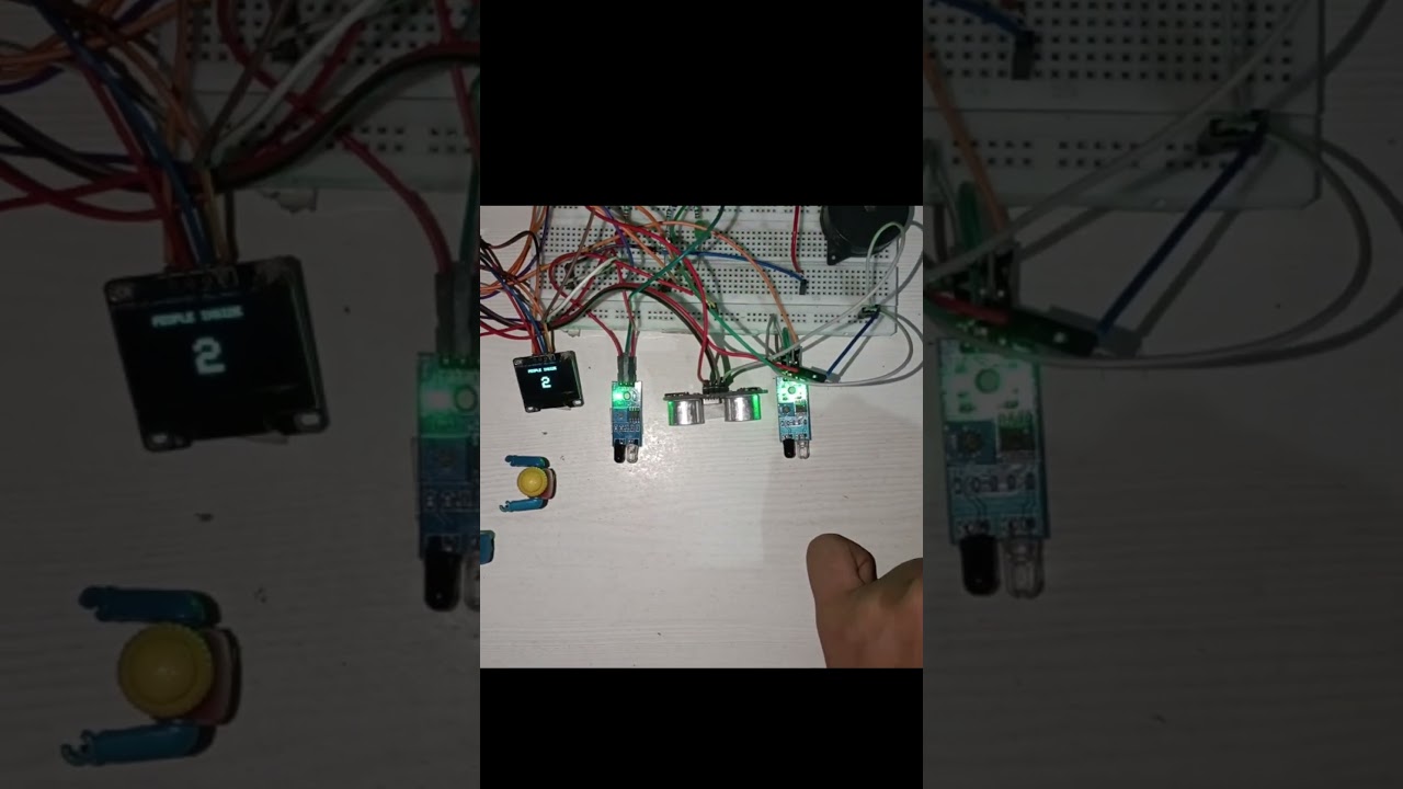 ESP32 Smart People Counter | Entry–Exit Detection with IR Sensors & OLED