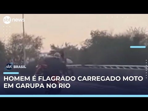 Video motociclista-e-flagrado-transportando-outra-moto-no-colo-no-rio-sbt-brasil
