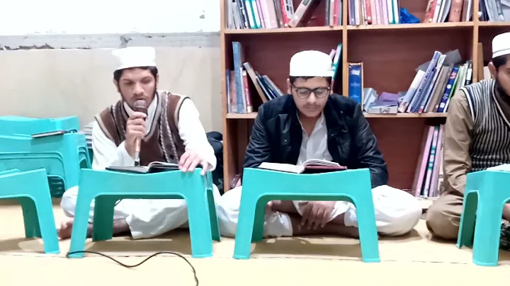 Qari Umair Athar teaching recitation to his student