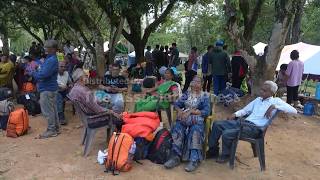 Rescue team brings rescued Indian tourists to safety after Nepal floods