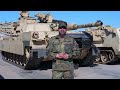 German Army Master Sgt. Steven Solis drives a 70-ton M1A2 Abrams Tank