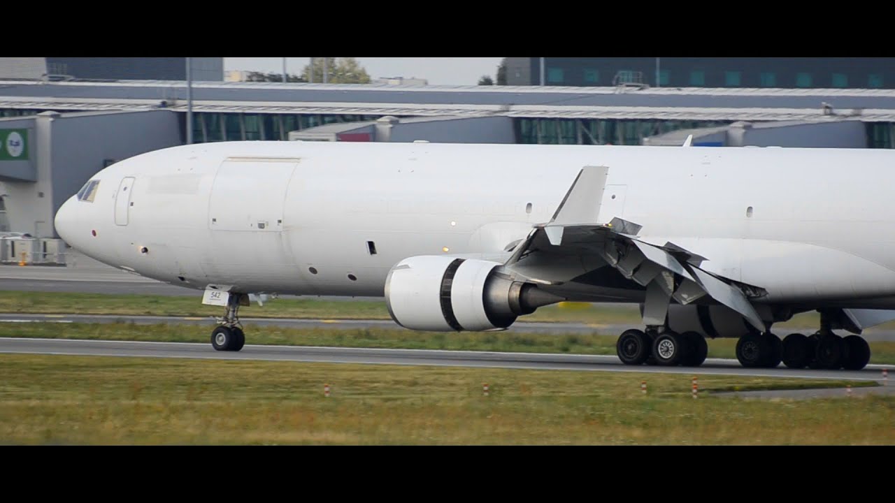 WHITE MD 11F Western Global Airlines LANDING AT WARSAW CHOPIN AIRPORT white-md-11f-western-global-airlines-landing-at-warsaw-chopin-airport