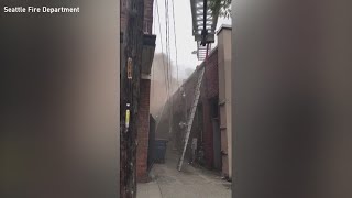 Crews fight major fire in Seattle's Ballard business district