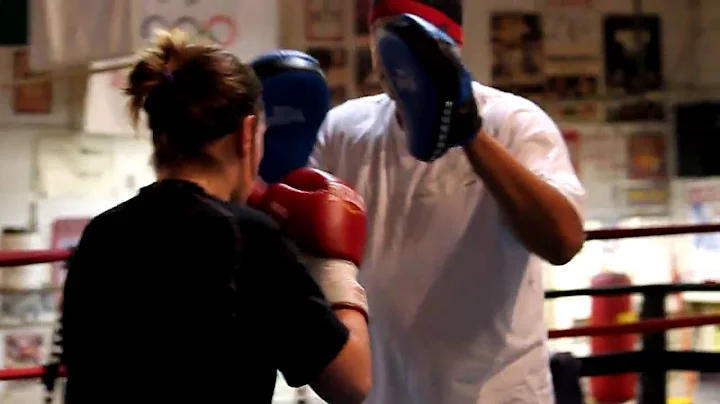 Heather Hartman and Virgil Hunter doing some pad w...