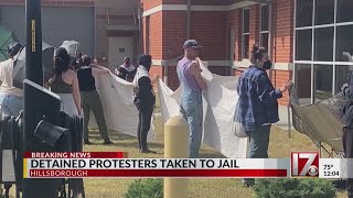 Detained protestors taken to jail