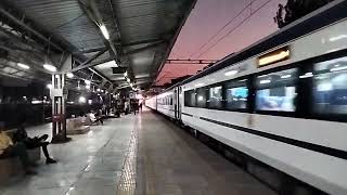 20902 Gandhinagar Mumbai Vande Bharat Express arrives at Vapi railway station.