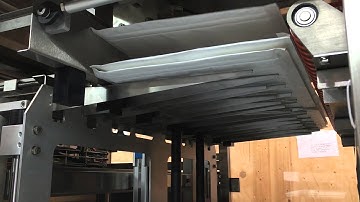 High Speed Stacker for stacking and banding padded envelopes, sheets, corrugated board, card etc