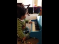 Kian playing the piano