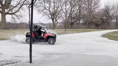 Polaris RZR Does Drifts, Donuts, and Burnout in Gravel