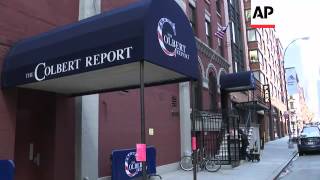 Fans outside "The Colbert Report" studio react to news that Stephen Colbert will replace David Lette