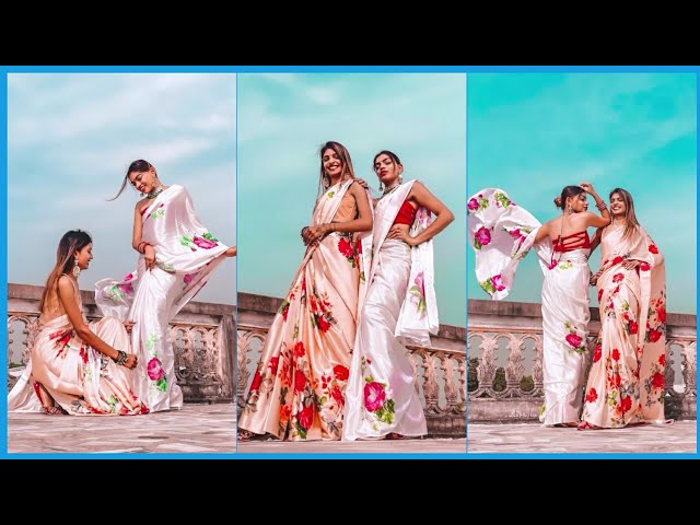 Premium Photo | Elegant and fashionable indian friends couple of woman in  saree and man in suit posed on the shore of the marina