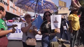 Relatives of deported Venezuelans imprisoned in El Salvador march in Caracas demanding their return