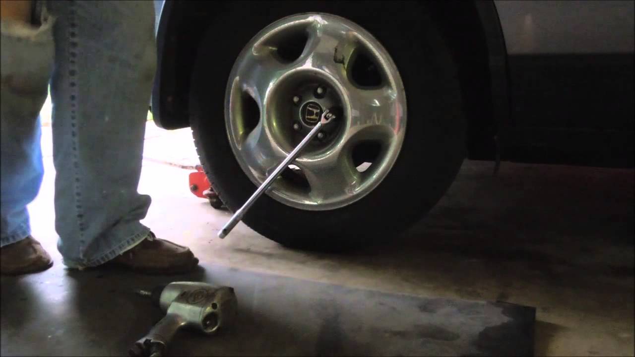 Surviving in the Suburbs Changing Honda CRV Brake Pads video