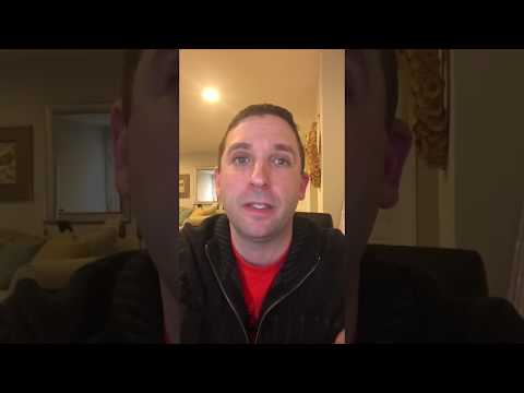 Principal Jeff Fink of Oakland Mills High School congratulates Latinx seniors