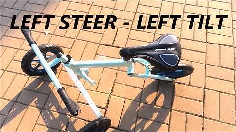 Self balanced trike by handlebar hinge suspended with nitrogen gas pneumatic shock absorber PATENTED