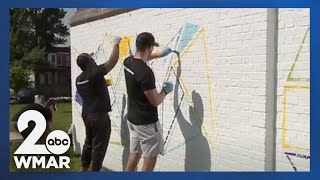 Ravens players transform Green Street Academy campus through community service project
