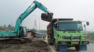 Kobelco Excavator Loading Soil Into Hino 500 Truck, Heavy Equipment Project