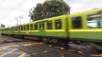 Dart class 8100 EMU (8314 and 8102) - Passes by Baldoyle Road level crossing.